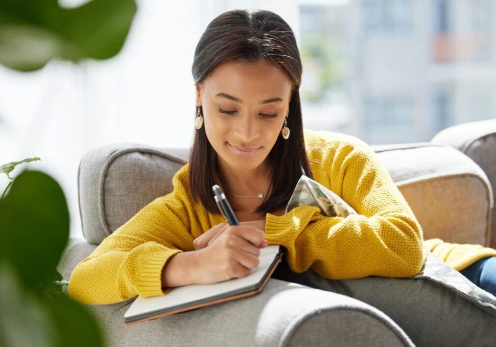 lady writing wedding vows for her special day